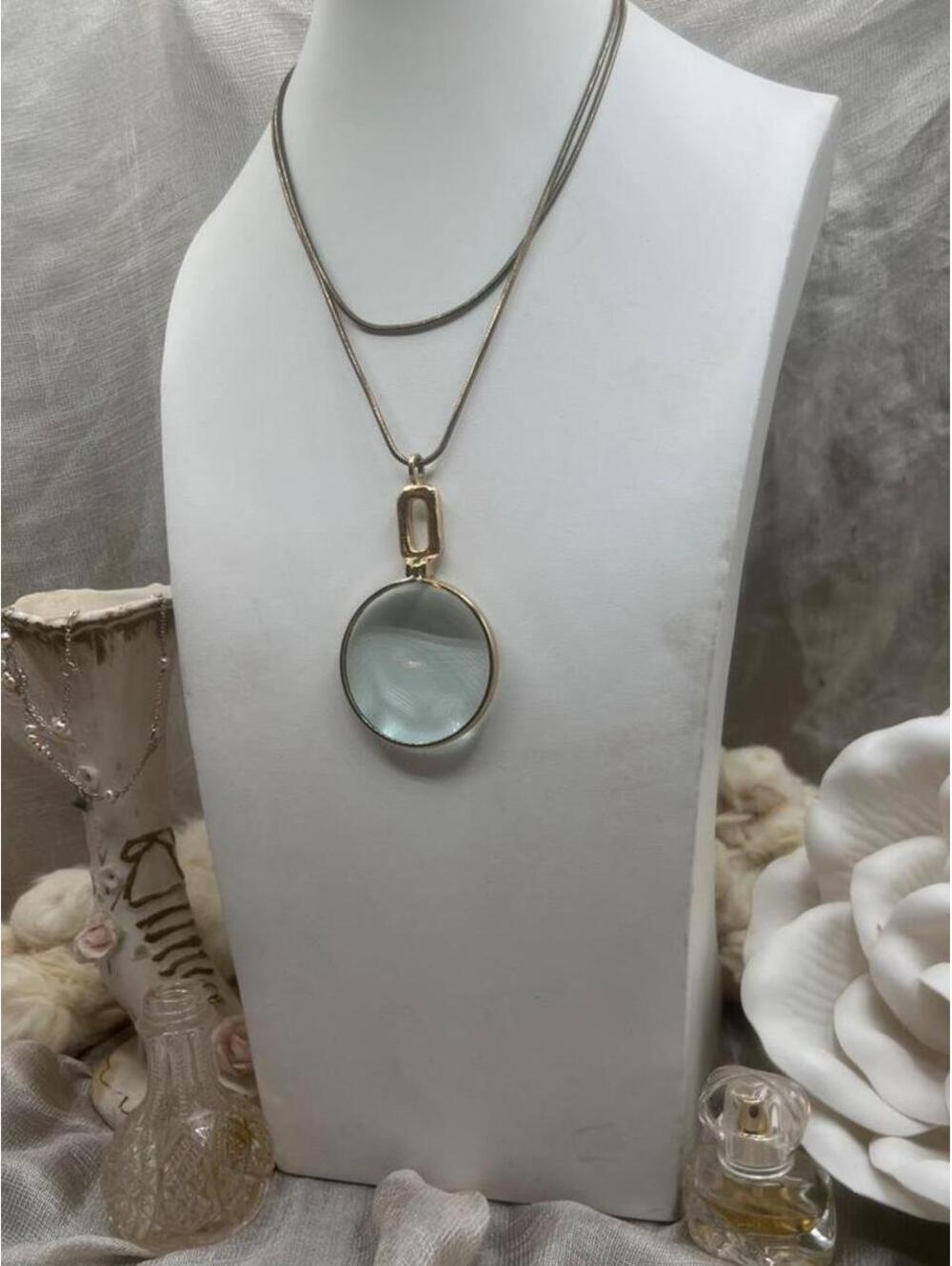 Vintage magnifying glass necklace with gold accents